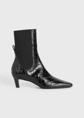 Croco-embossed mid-heel boots black